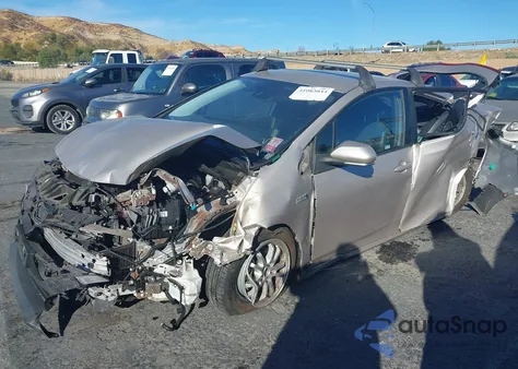 2021 Toyota Prius Prime Limited from USA, damaged, VIN JTDKAMFP3M3180368